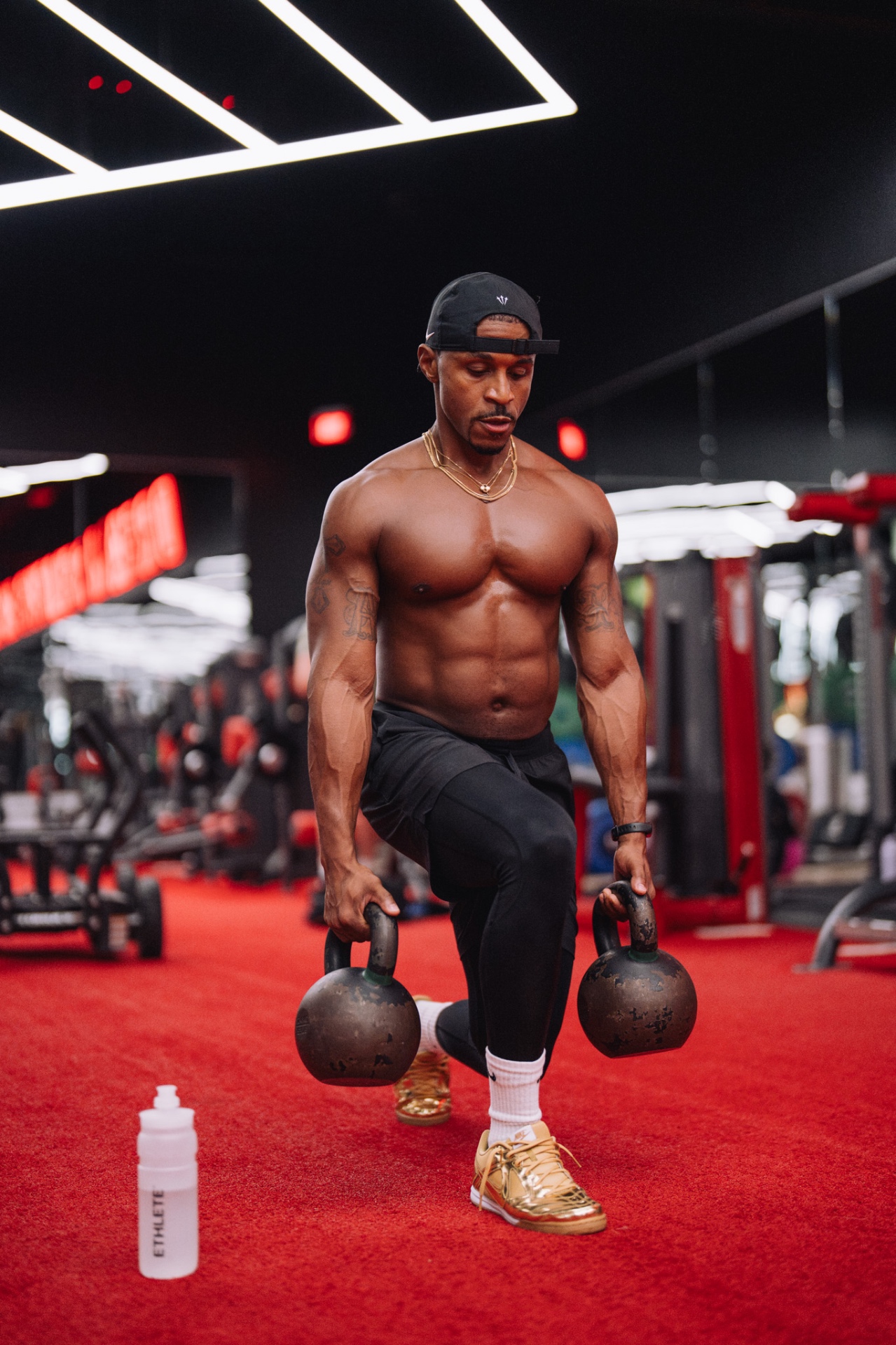 Alex Tellem training with kettlebells for the Ethlete campaign