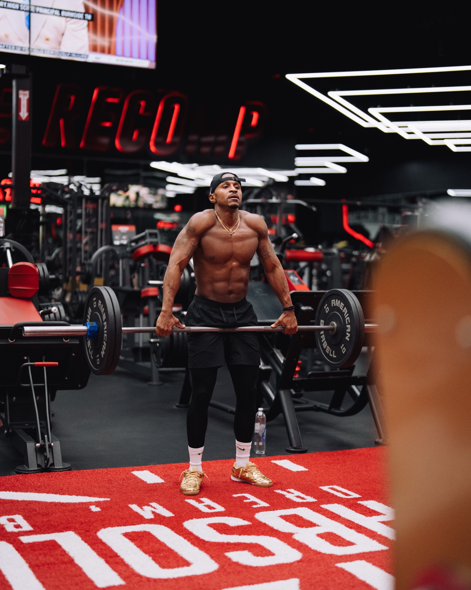 Alex Tellem mid barbell row during the ETHLETE shoot